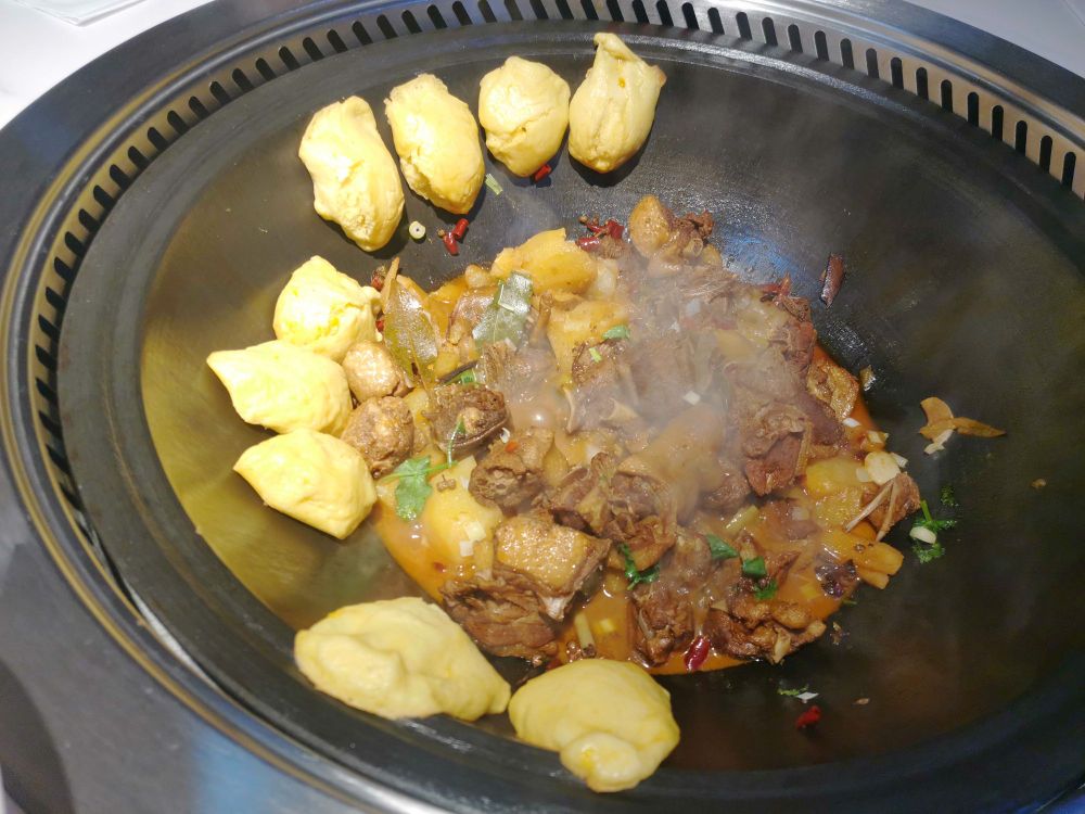 喜笄蜣满屯北吆东铁锅炖(凤城二路店)